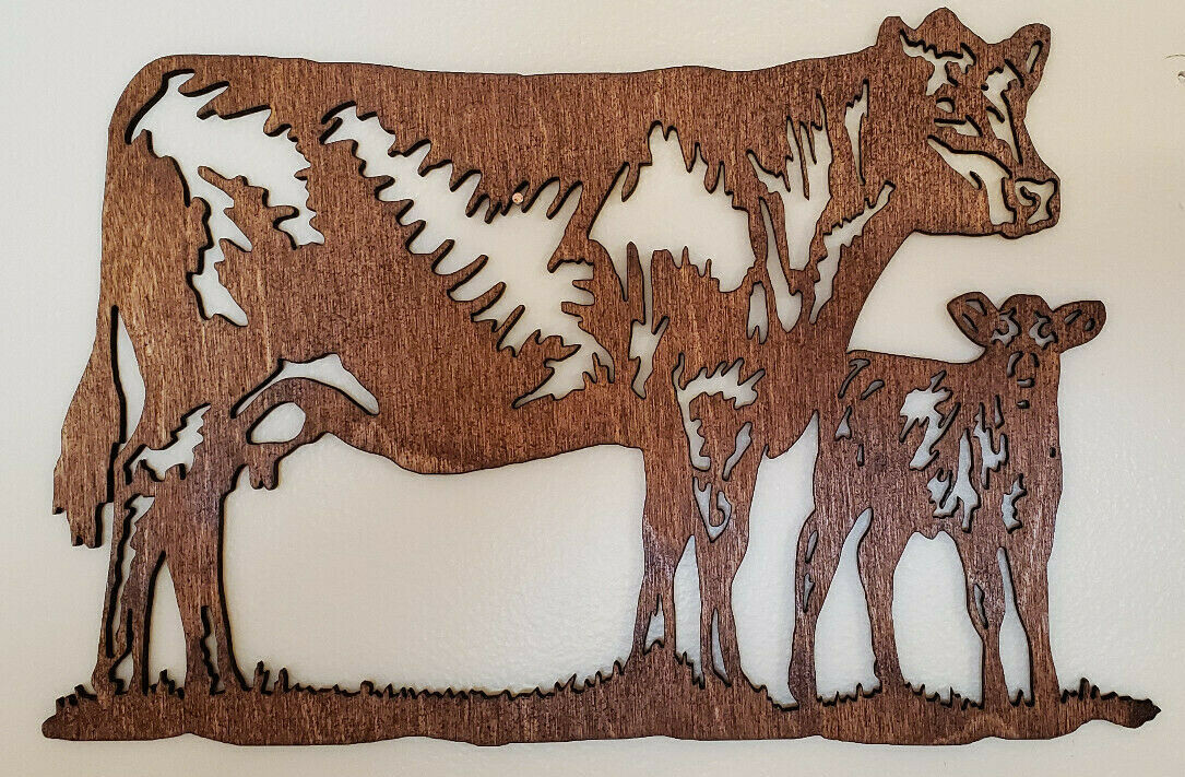 Beautiful Custom made Cows accent for your picture arrangements.