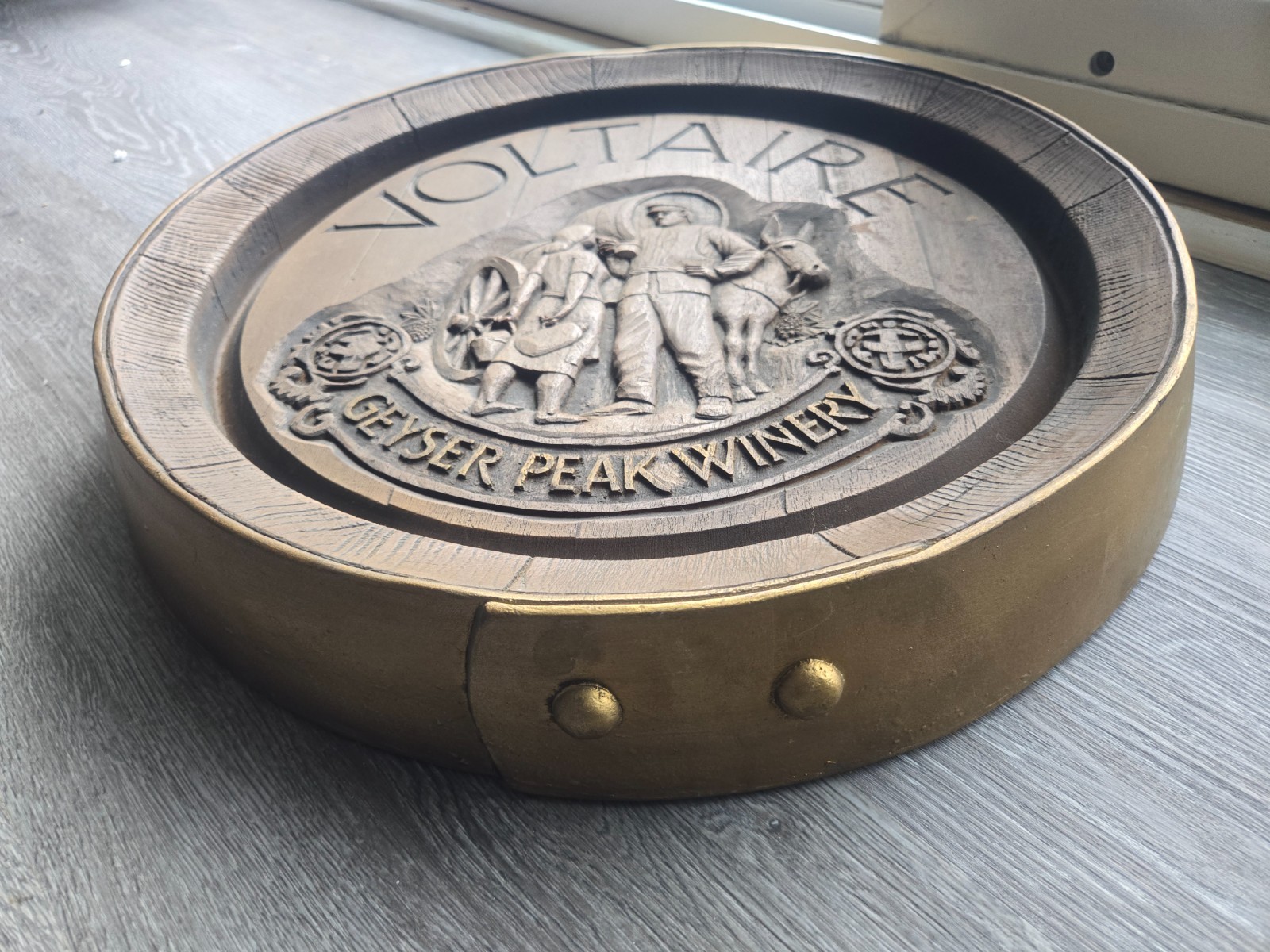 Vintage Decorative wall plaque featuring a pastoral carving