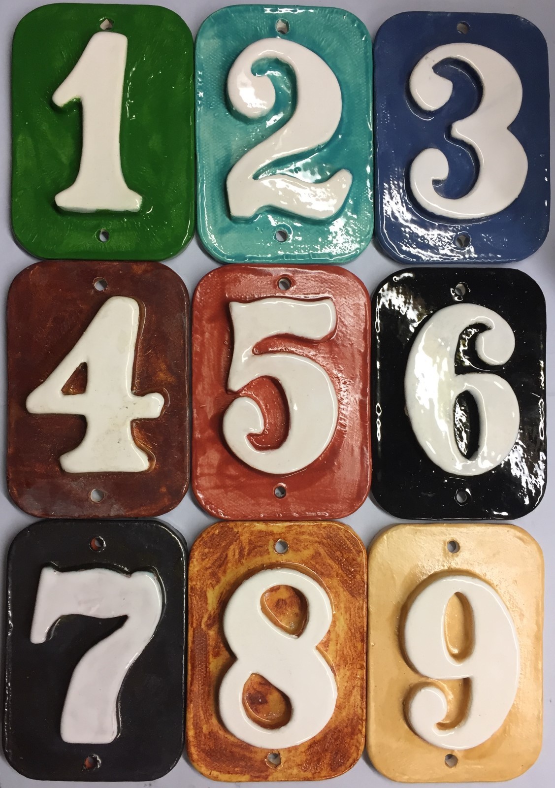 Custom Tile House Post numbers. 80 glaze options free shipping. Applewood Pot.