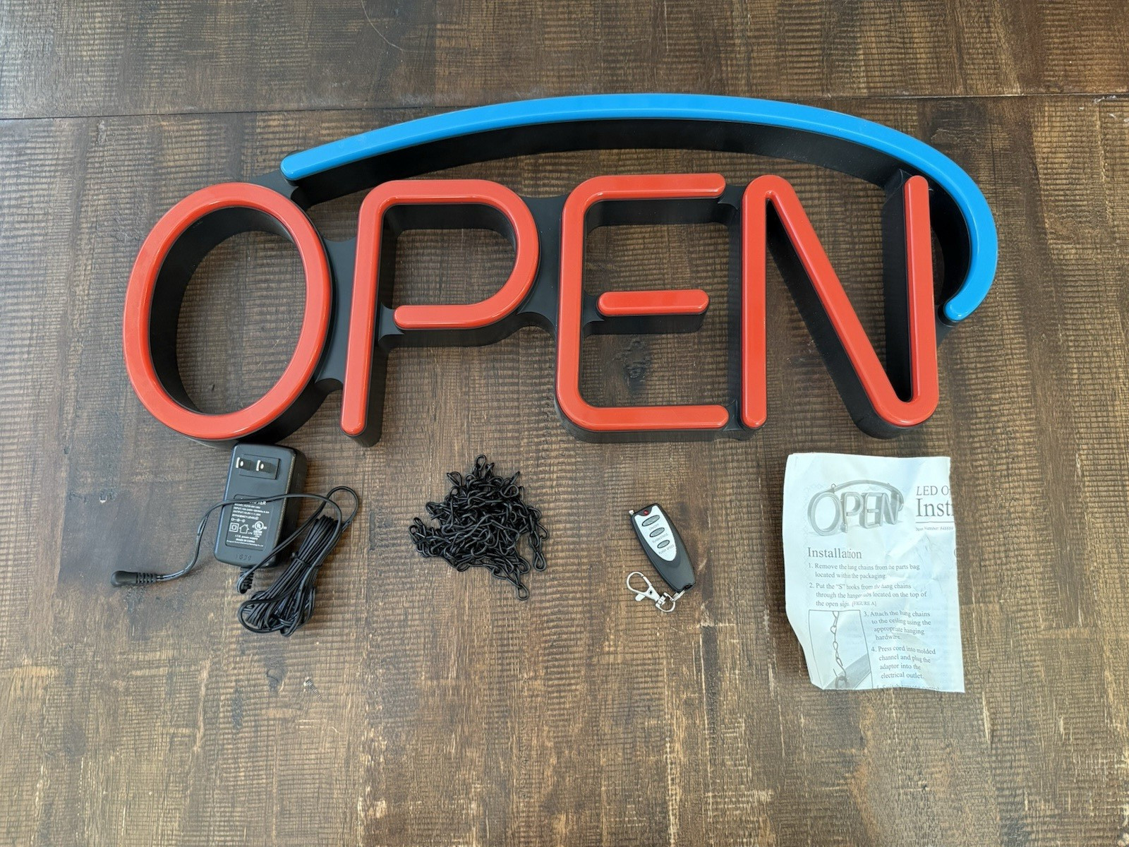 Hillman Plastic Indoor and Outdoor LED Lighted Open Sign 848889 w/ Remote